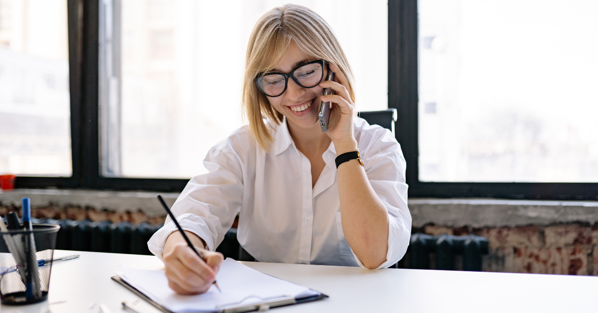 Fundraiser making a phone call as part of a year-end major donor fundraising strategy