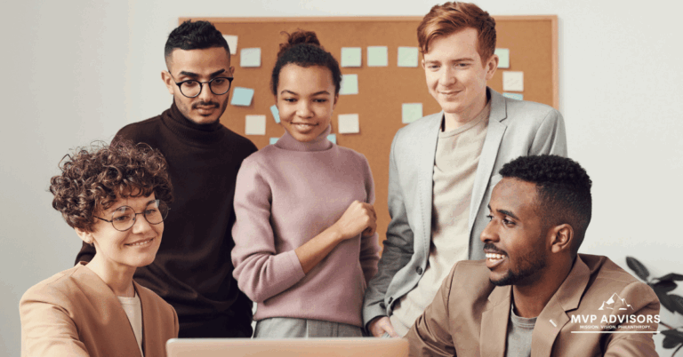 Group of people form a year-end fundraising team in this blog header image
