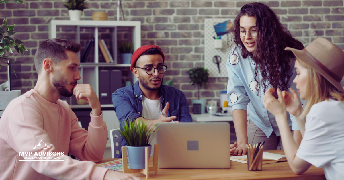 Blog header image showing a nonprofit team working on setting fundraising goals for their organization